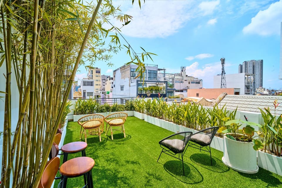 Property building, Patio, Day, Neighbourhood, Natural landscape, Garden, View (from property/room), Seating area, Quiet street view