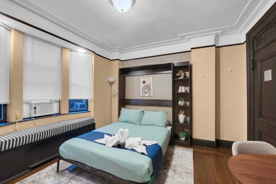Bed, Living room, Photo of the whole room, Seating area, Bedroom, towels, wardrobe