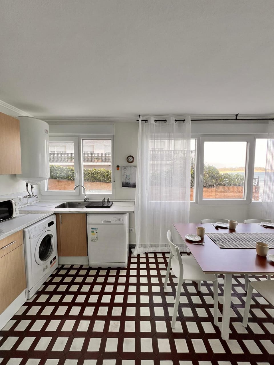 Kitchen or kitchenette, Dining area, dishwasher, oven, stove, washing machine