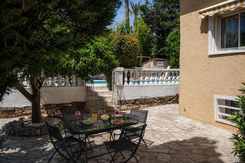 Property building, Patio, Spring, Day, Garden, View (from property/room), Balcony/Terrace, Dining area, Garden view, Pool view, Swimming pool, sunbed