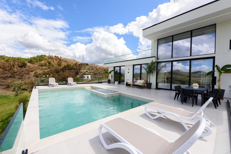 Property building, Patio, Natural landscape, Mountain view, Pool view, Swimming pool