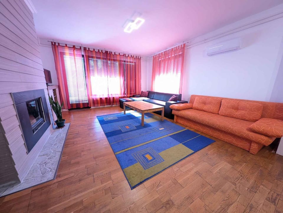 Living room, Seating area, fireplace, air conditioner