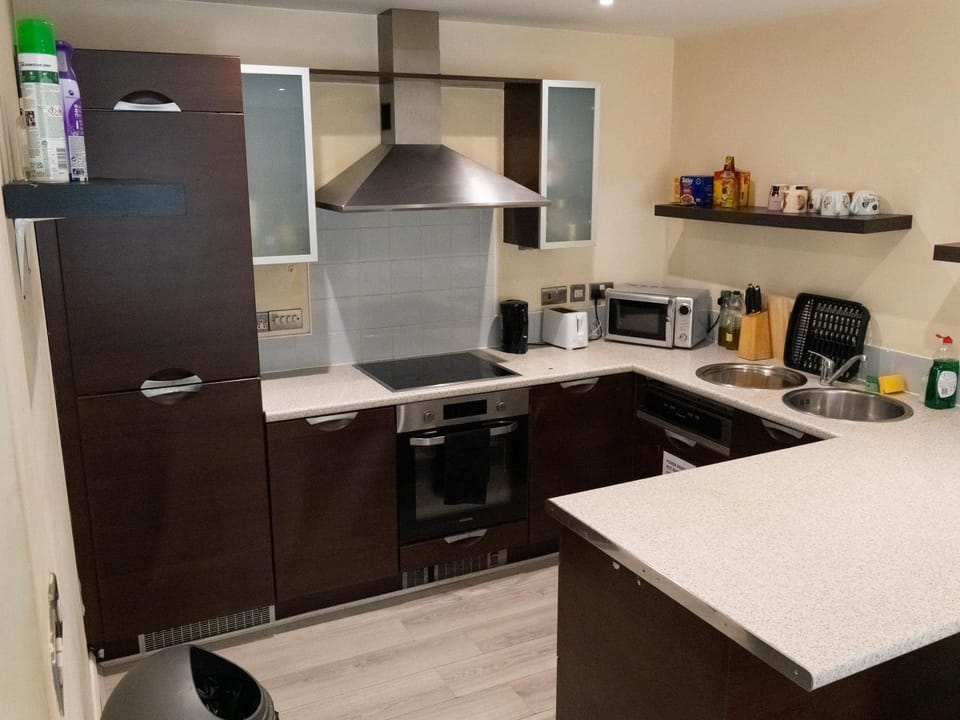 Kitchen or kitchenette, oven, stove, toaster