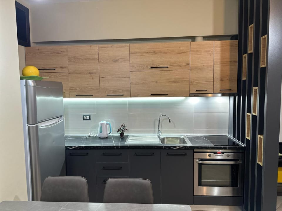 Kitchen or kitchenette, oven, stove