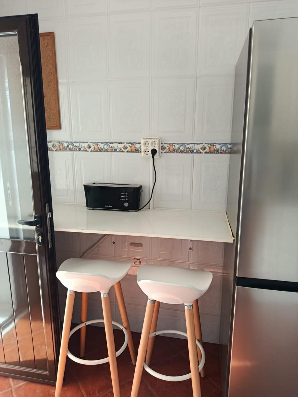 Kitchen or kitchenette, microwave, oven, stove, toaster