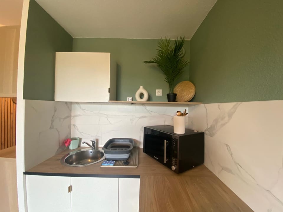 Kitchen or kitchenette, stove
