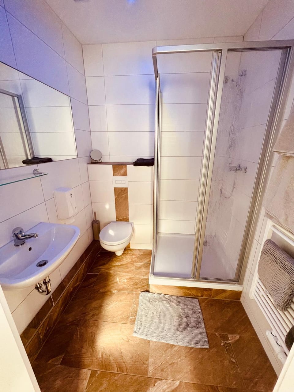 Shower, Toilet, Bathroom, hair dryier, towels