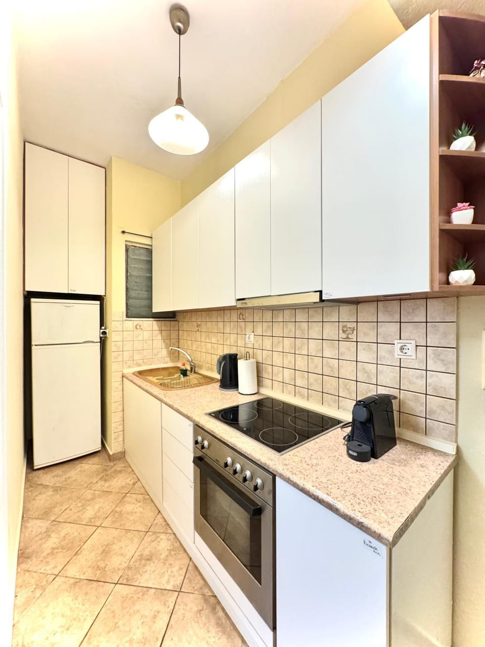 Kitchen or kitchenette, oven, stove