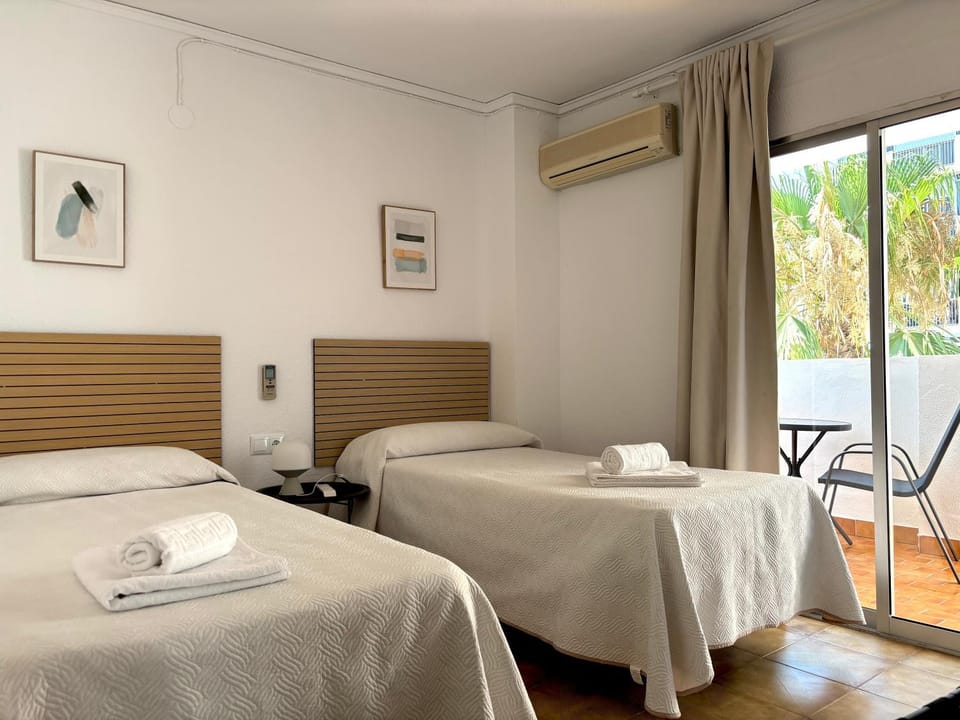 Bed, Photo of the whole room, Bedroom, towels, air conditioner