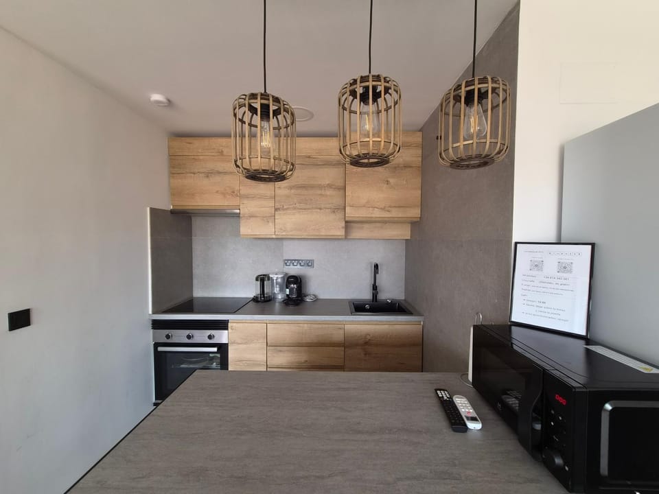Kitchen or kitchenette, stove
