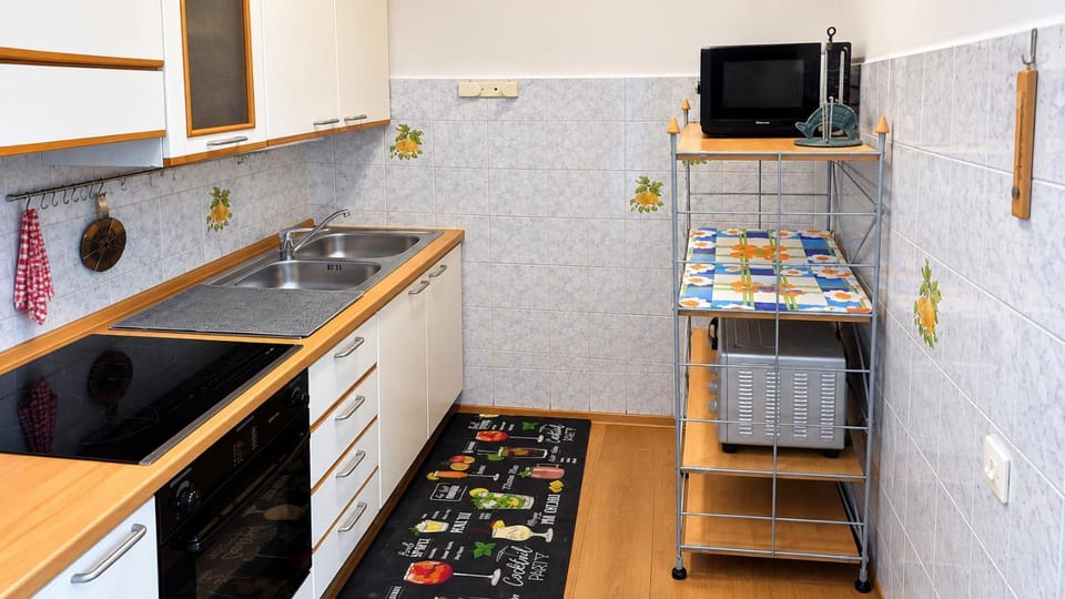 Kitchen or kitchenette, stove