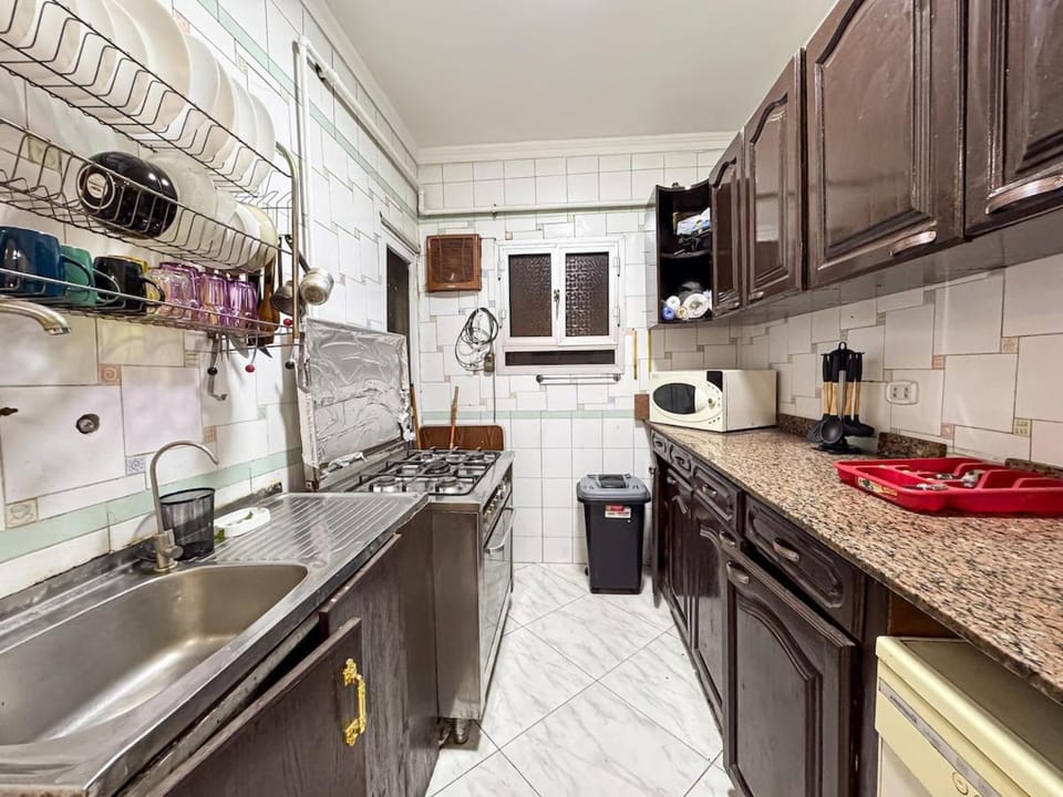 Kitchen or kitchenette, oven, stove