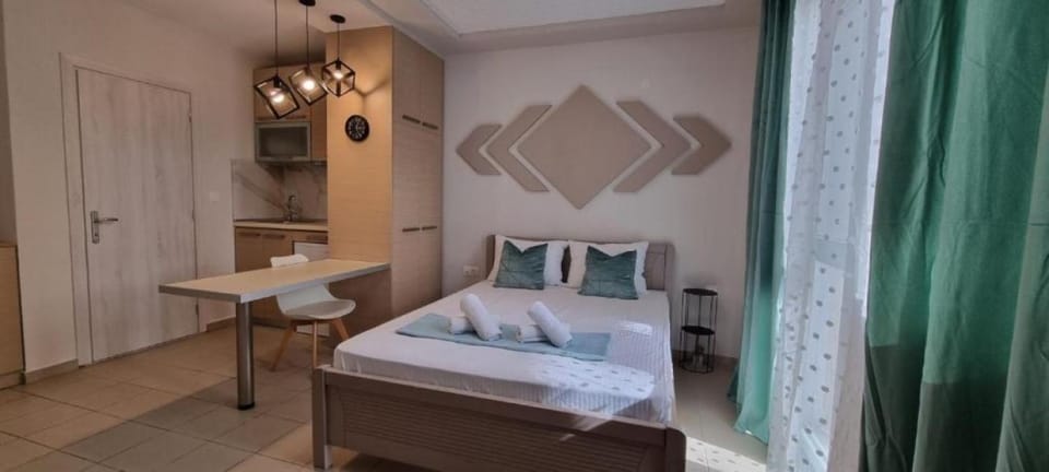Bed, Kitchen or kitchenette, Bedroom, towels, wardrobe