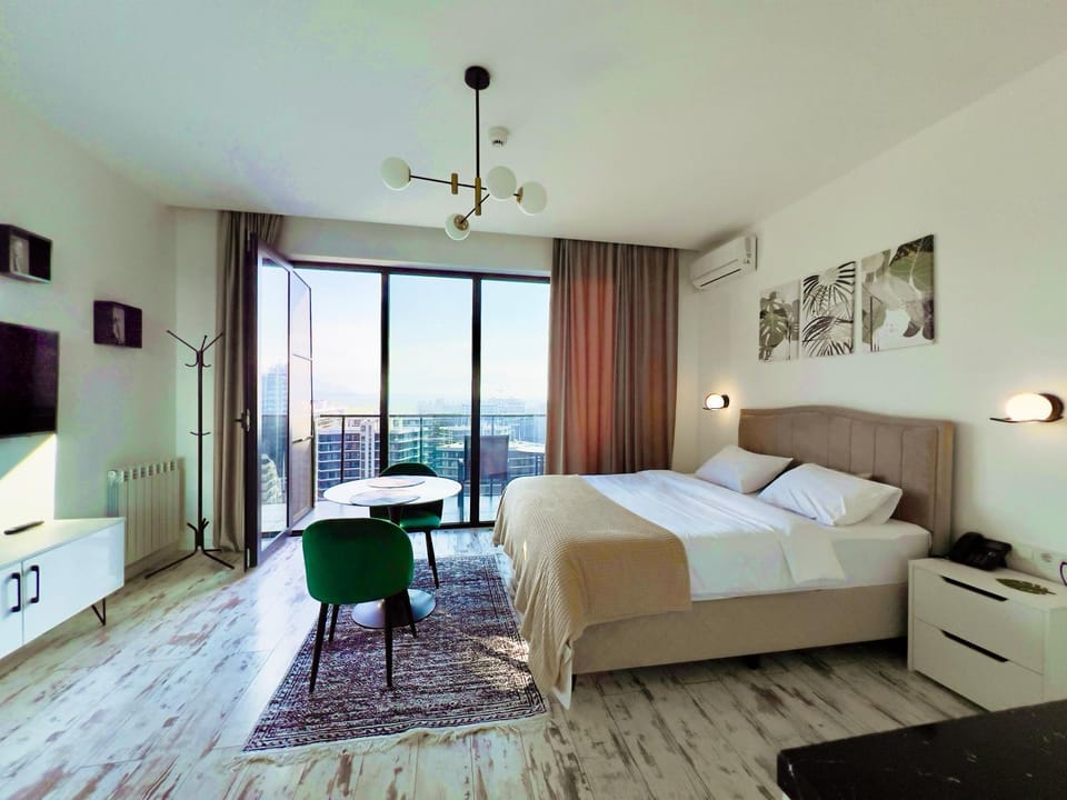 Люкс апартаменты студия в Steps с видом на море и горы Apartment in Batumi