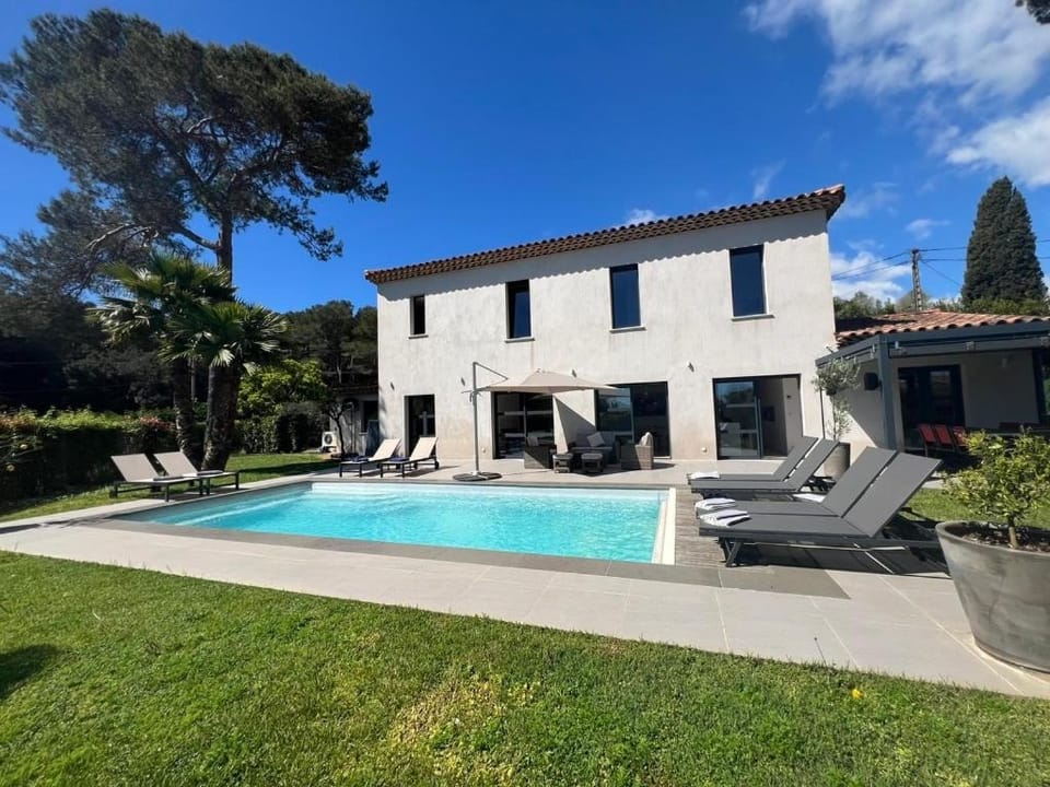 Property building, Patio, Pool view, Swimming pool, sunbed