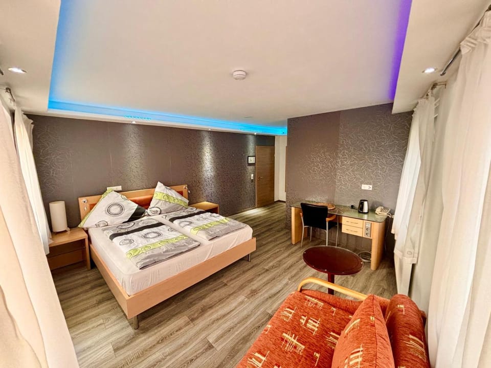 Bed, Seating area, Bedroom