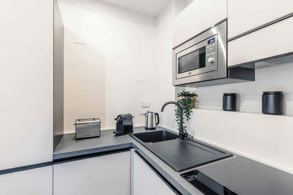 Kitchen or kitchenette, stove, toaster