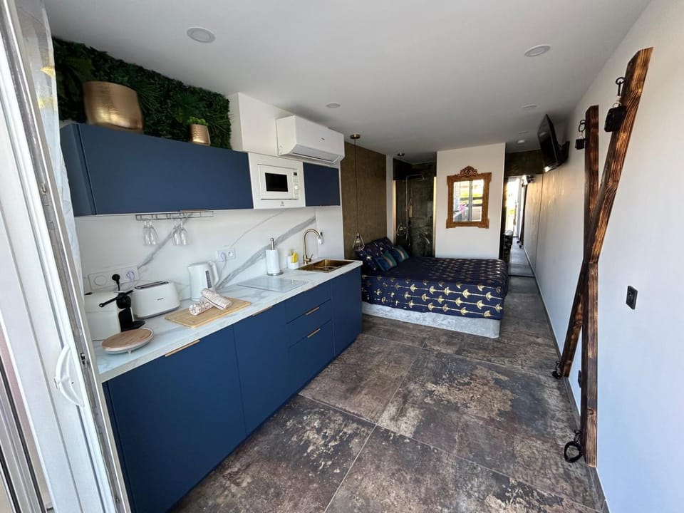 Kitchen or kitchenette, stove