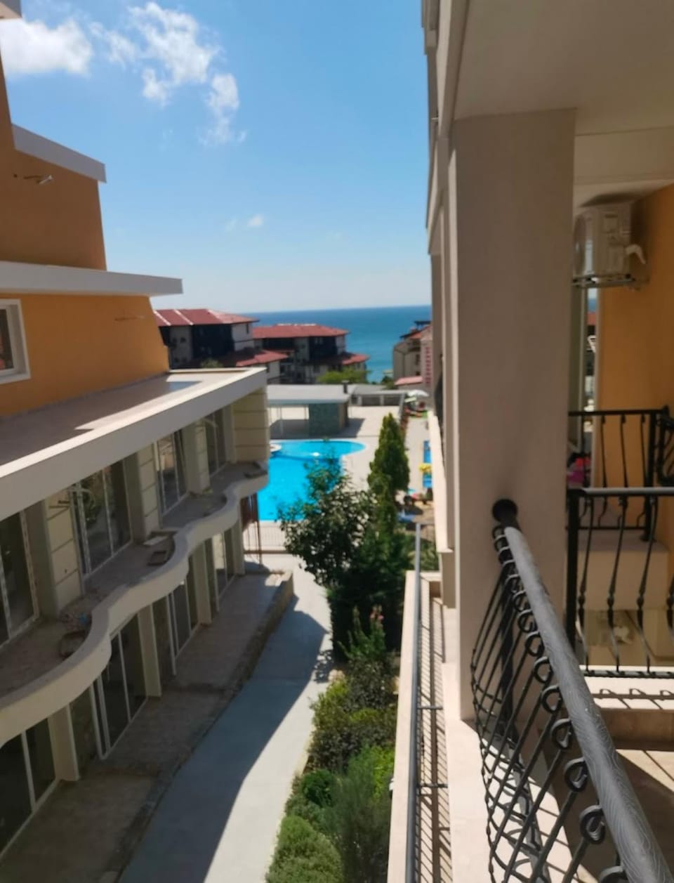 Property building, Patio, View (from property/room), Balcony/Terrace, Pool view, Sea view, Swimming pool