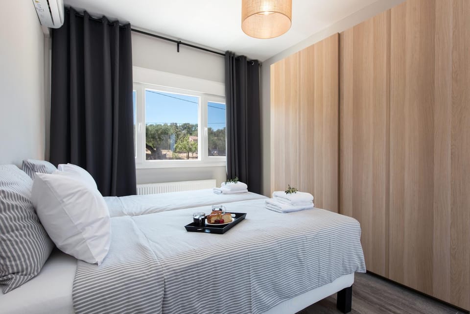 Bed, Bedroom, towels, wardrobe, air conditioner