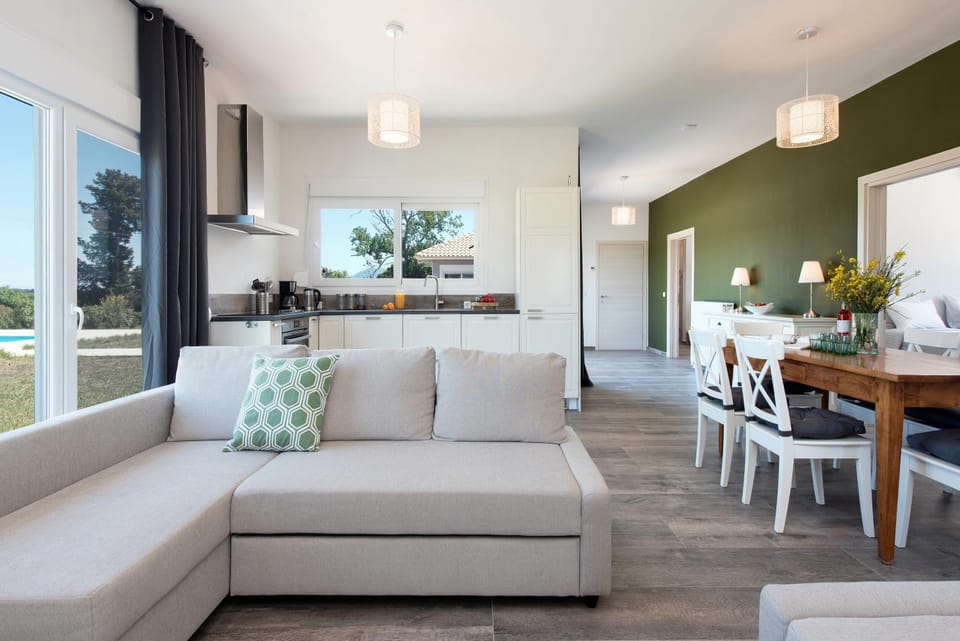 Kitchen or kitchenette, Living room, Seating area, Dining area, Pool view