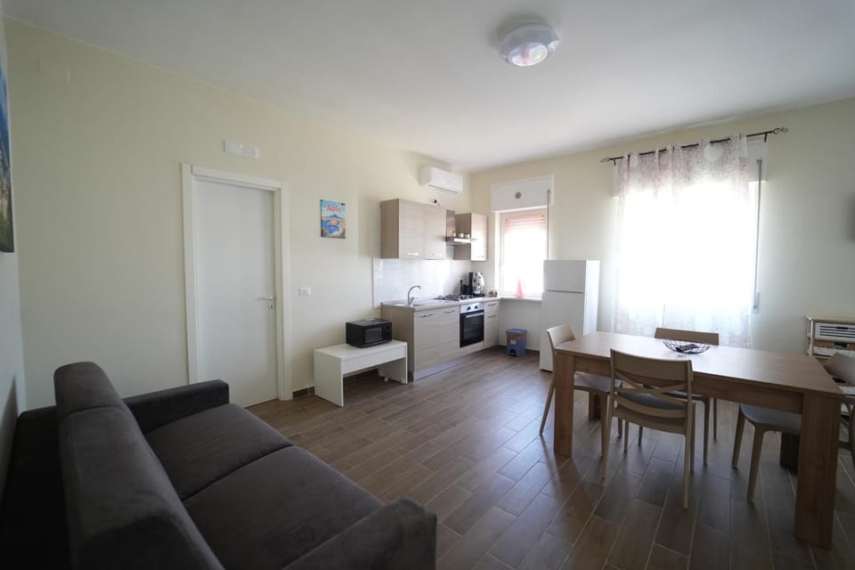Kitchen or kitchenette, Living room, Seating area, Dining area, stove