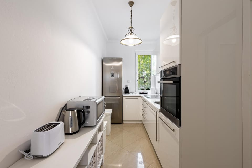 Kitchen or kitchenette, oven, stove, toaster