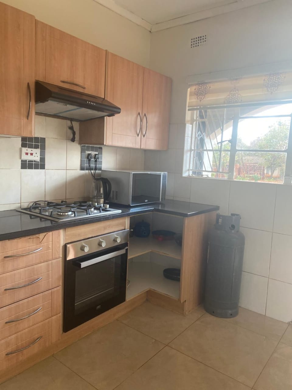 Kitchen or kitchenette, stove