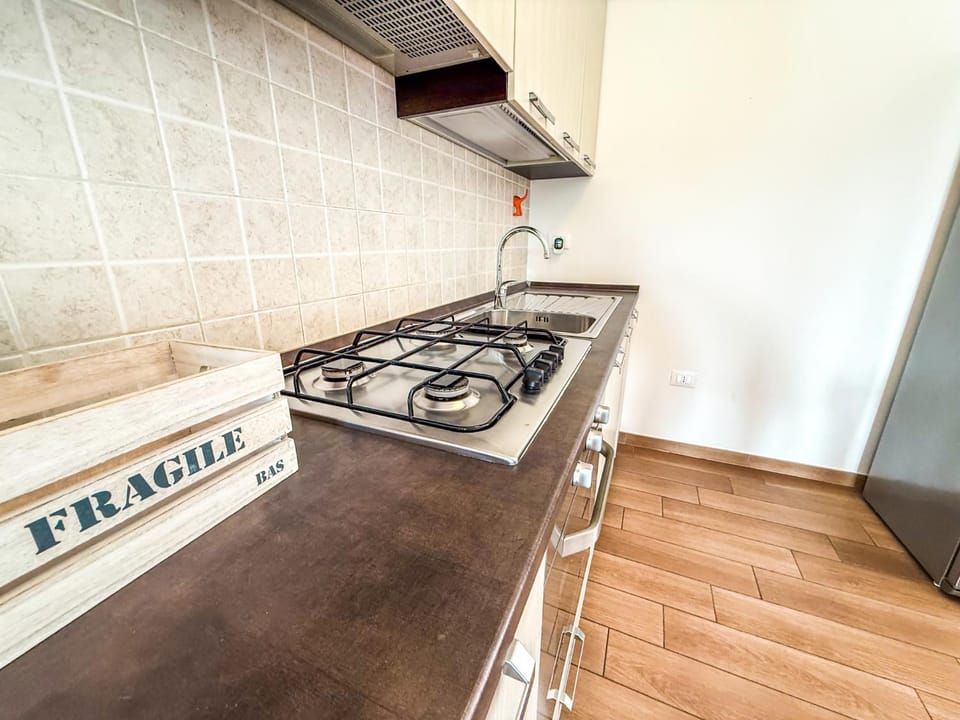 Kitchen or kitchenette, stove