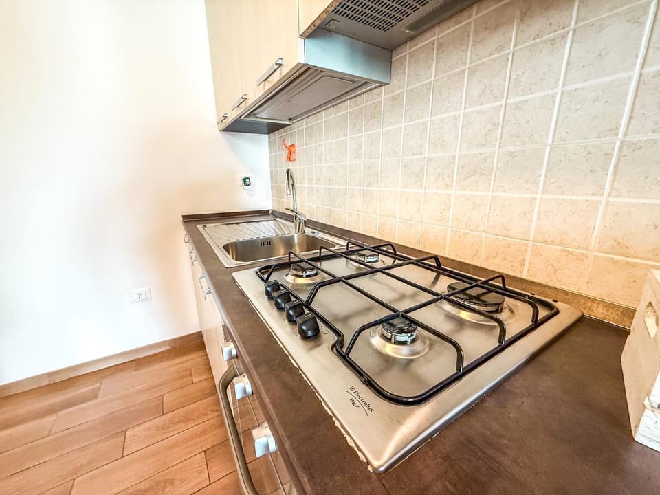 Kitchen or kitchenette, stove