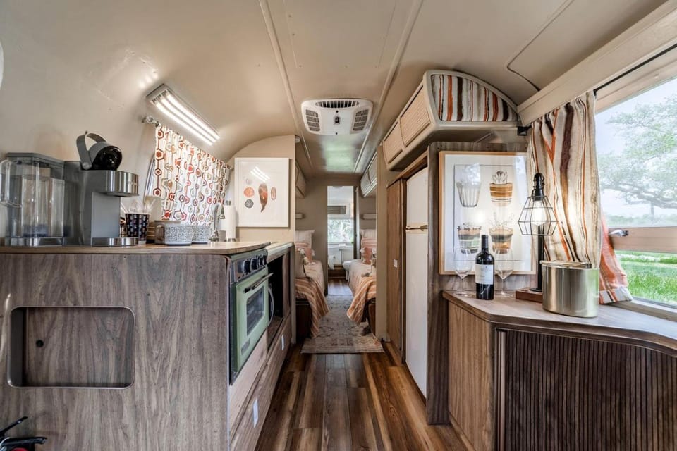 Newly Renovated Camper with Fresh Decor and Tiny Deck in Texas House in Lake Travis