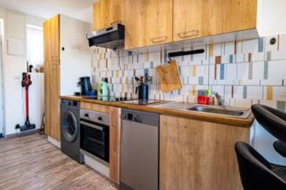 Kitchen or kitchenette, dishwasher, oven, stove, toaster