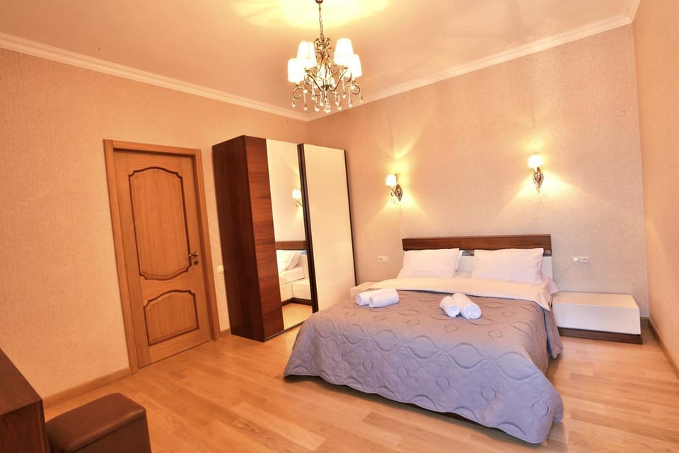 Bed, Photo of the whole room, Bedroom, towels, wardrobe