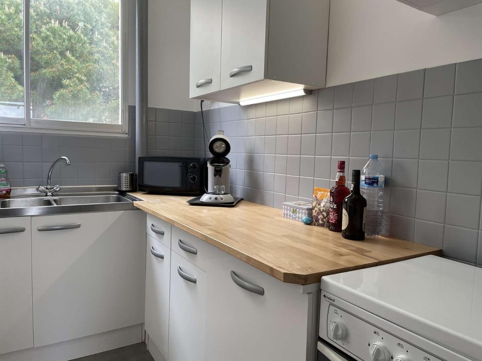Kitchen or kitchenette, stove