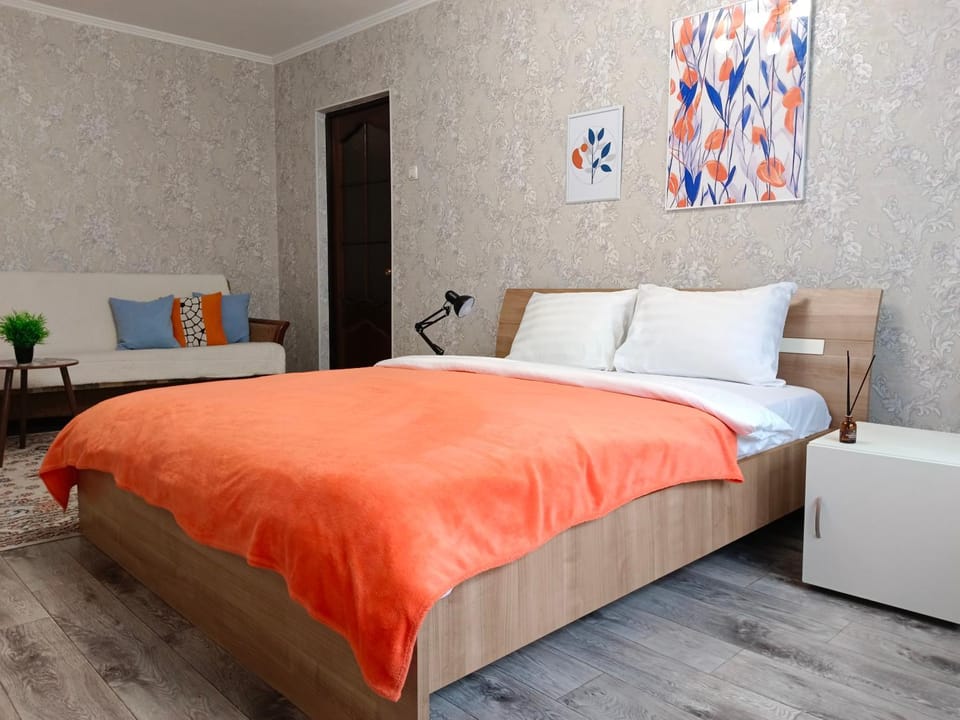 Bed, Living room, Seating area, Bedroom