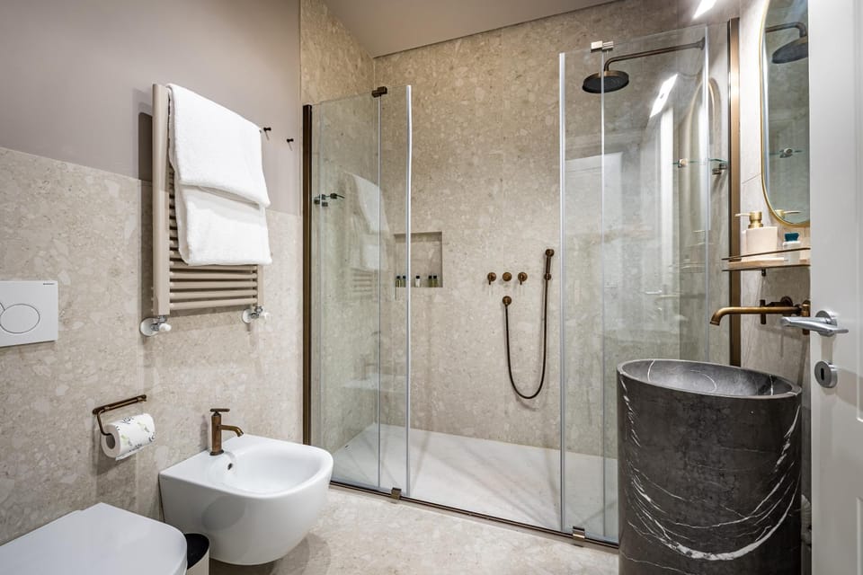 Shower, Bathroom, hair dryier, towels