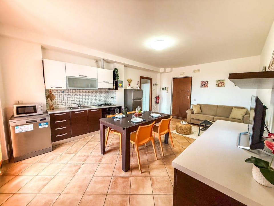 Kitchen or kitchenette, Living room, Seating area, Dining area