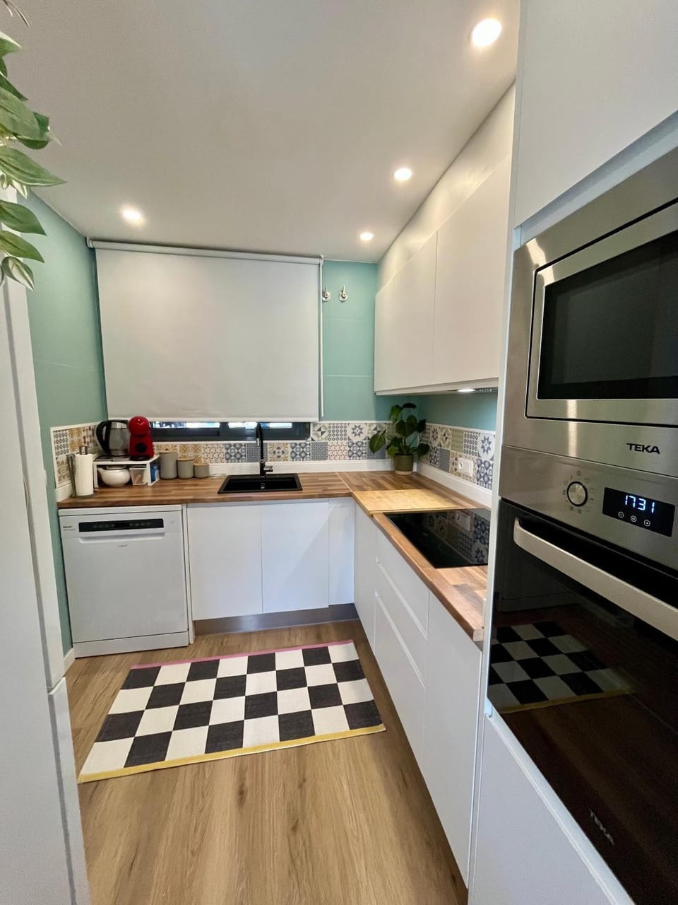 Kitchen or kitchenette, dishwasher, oven, stove, toaster