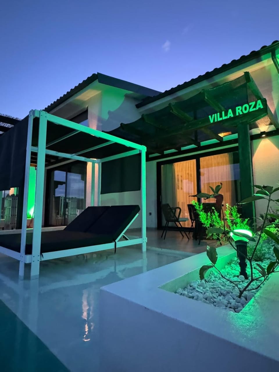 Patio, Night, Pool view, Swimming pool, sunbed