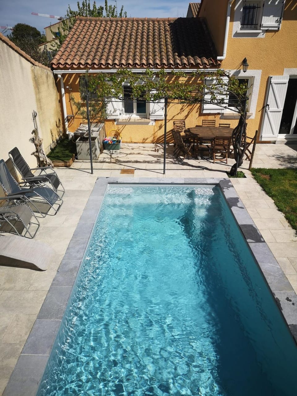 Swimming pool, sunbed