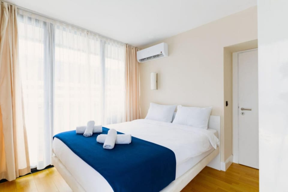 Bed, Photo of the whole room, Bedroom, towels, air conditioner