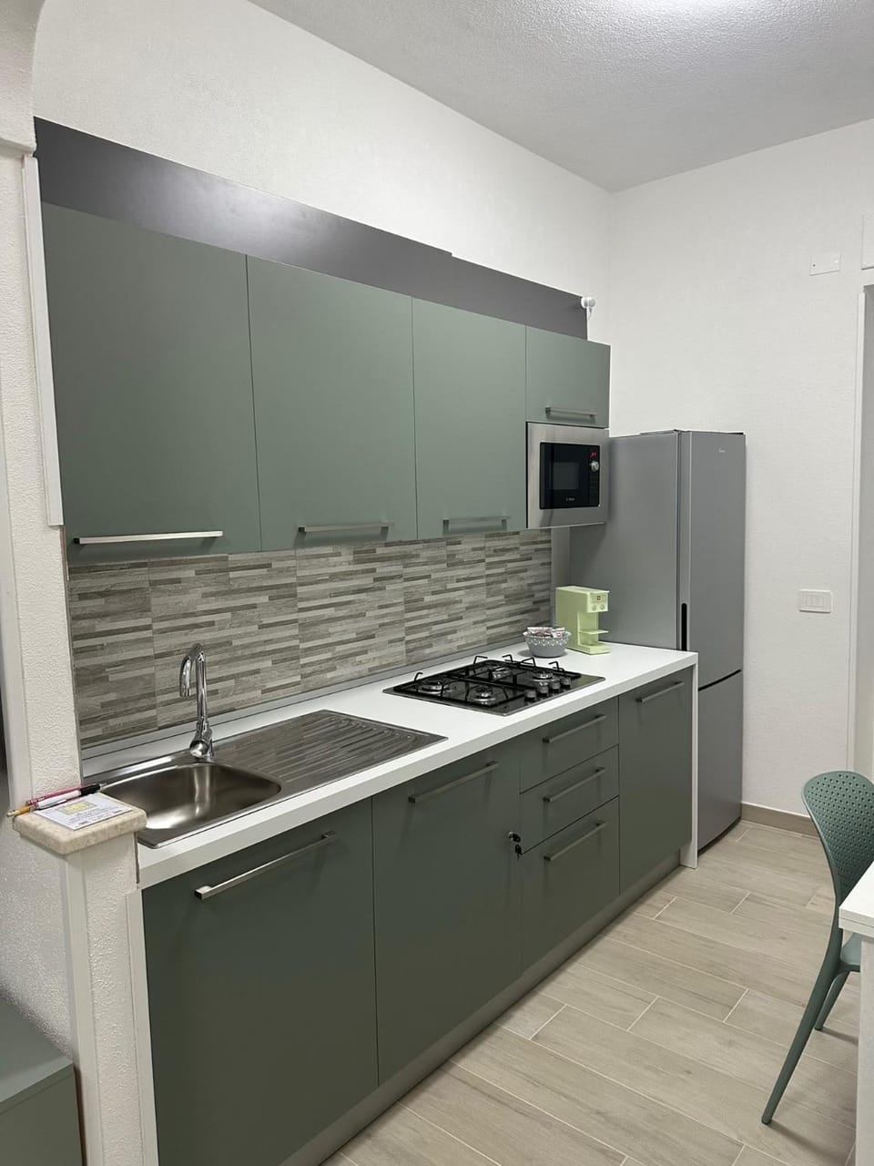 Kitchen or kitchenette, stove