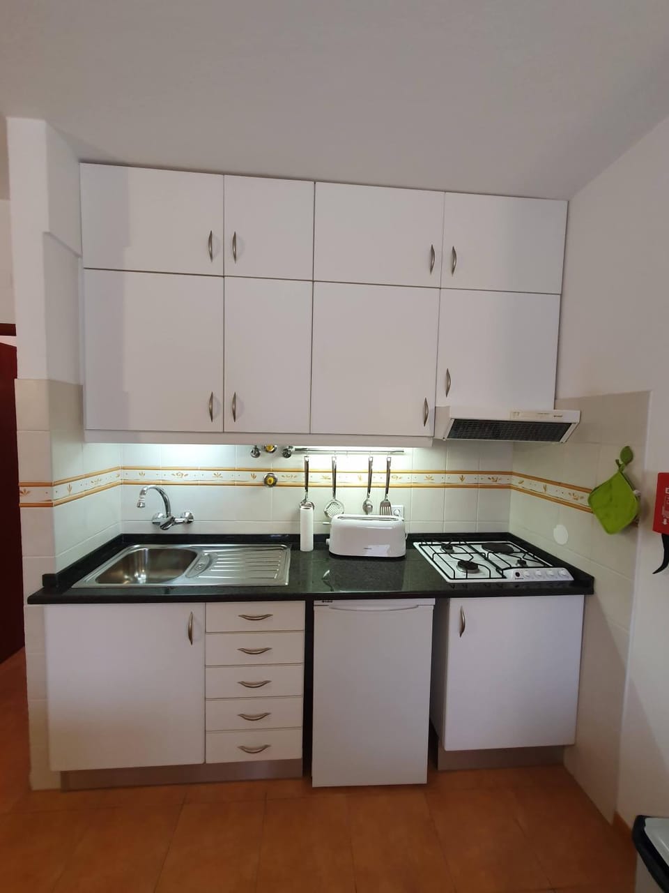Kitchen or kitchenette, stove