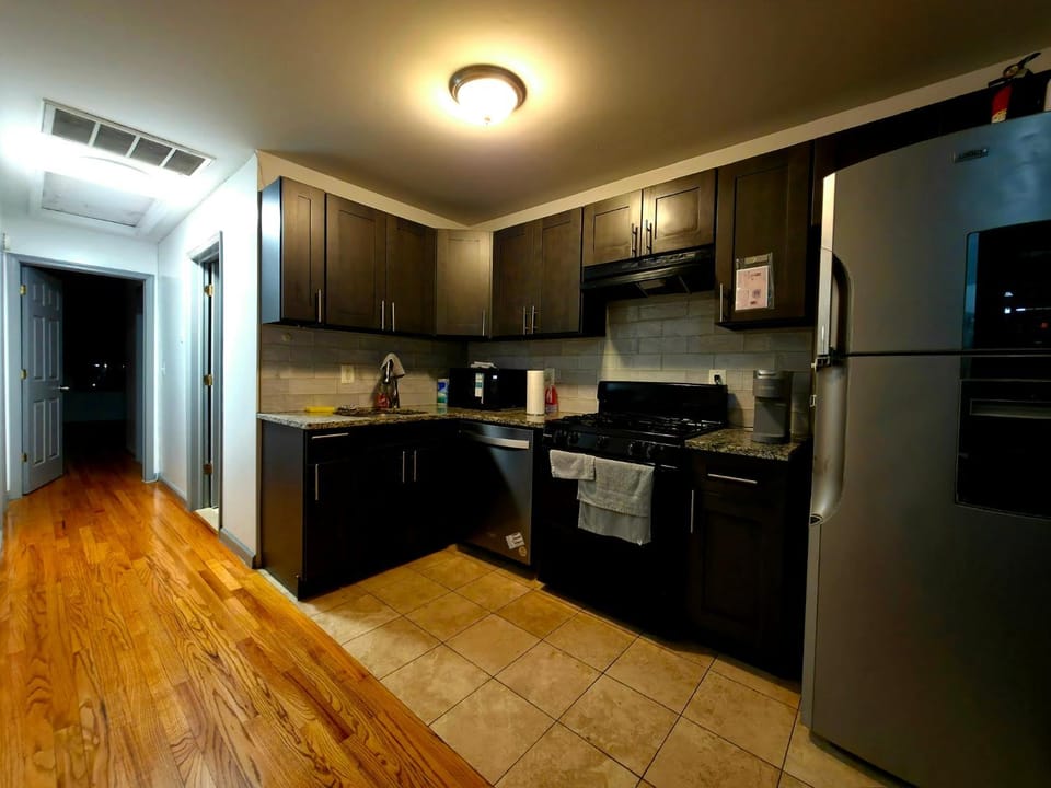 Kitchen or kitchenette, dishwasher, stove, toaster