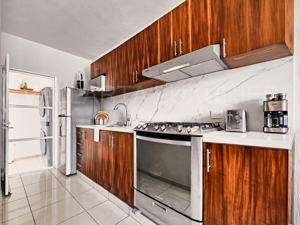 Coffee/tea facilities, Kitchen or kitchenette, oven, stove, toaster, washing machine, dryer