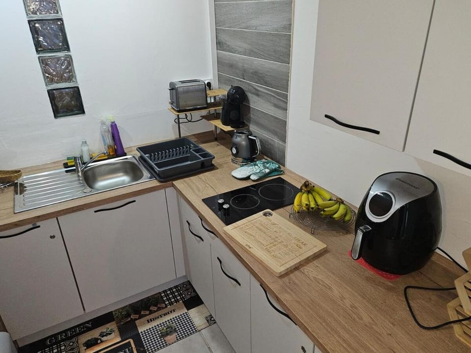 Kitchen or kitchenette, stove, toaster