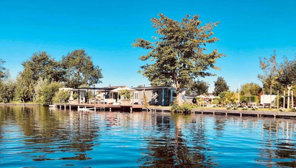 Property building, Day, Natural landscape, Lake view