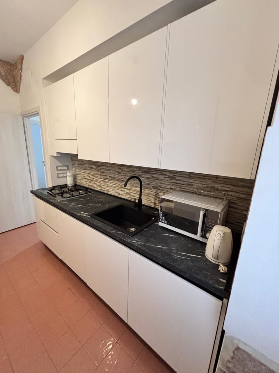Kitchen or kitchenette, stove