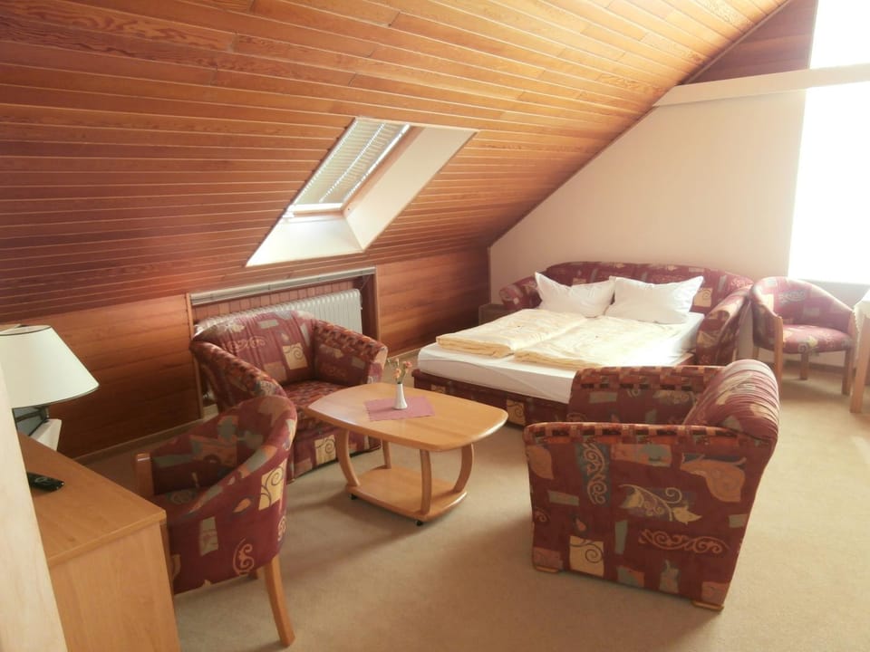 Bed, Seating area, Bedroom