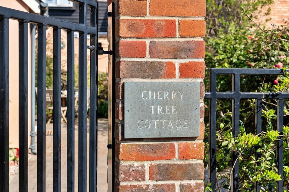 Property building, Patio, Day, Property logo or sign, Garden, Garden view